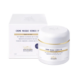 Skincare cream jar and box with gold accents on a white background