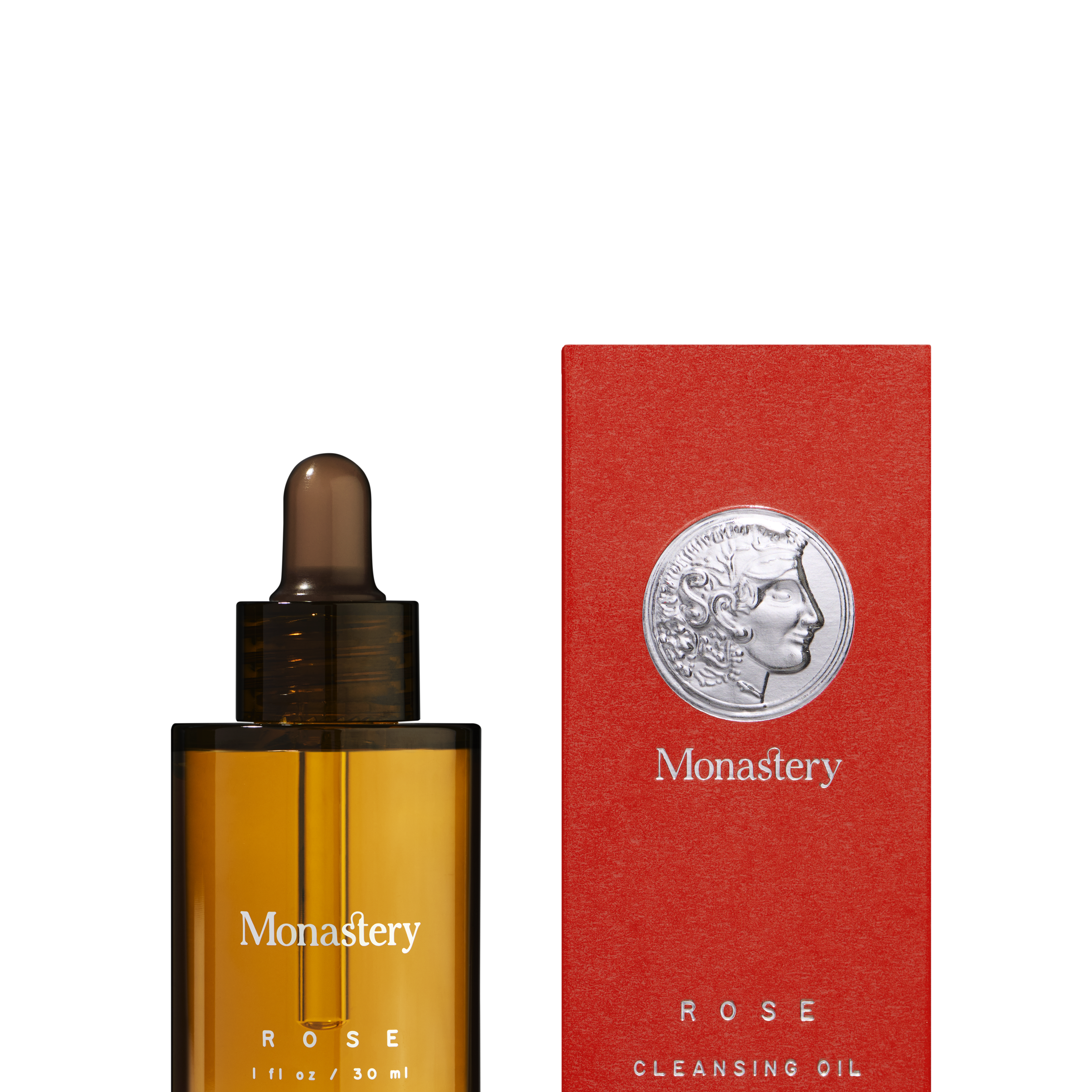Monastery Rose Cleansing Oil bottle and red box with embossed silver coin design